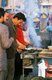 China: Kebab vendor with sheep's hearts on the grill, Khotan, Xinjiang Province